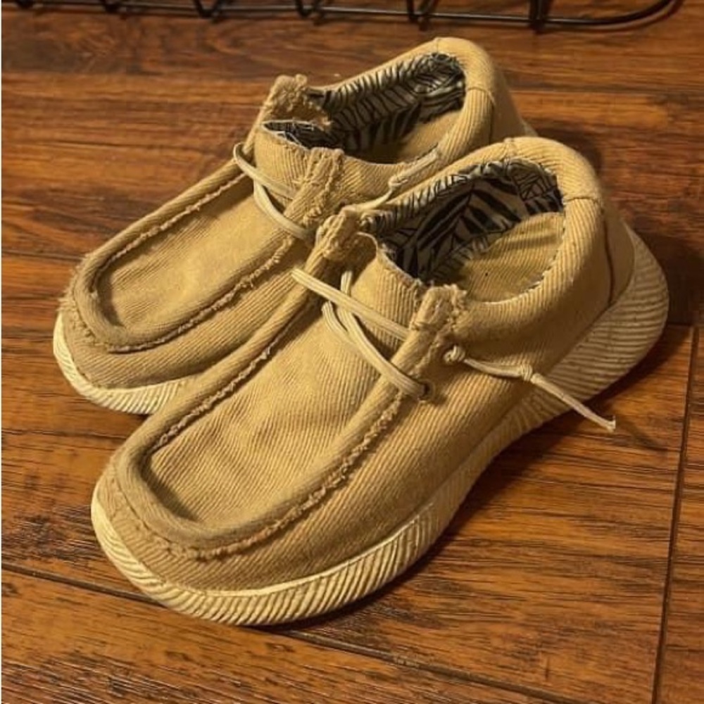 Childrens tan slip on shoes